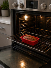 Load image into Gallery viewer, Oven &amp; Microwave Safe Silicone Collapsible Container - Cook, Freeze, Heat, Store all in the Same Container!